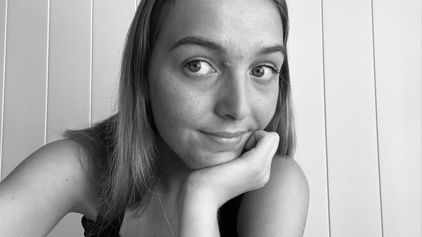 Close up black and white photo of Meg Brown.