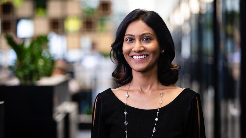 Professional female academic standing in an office