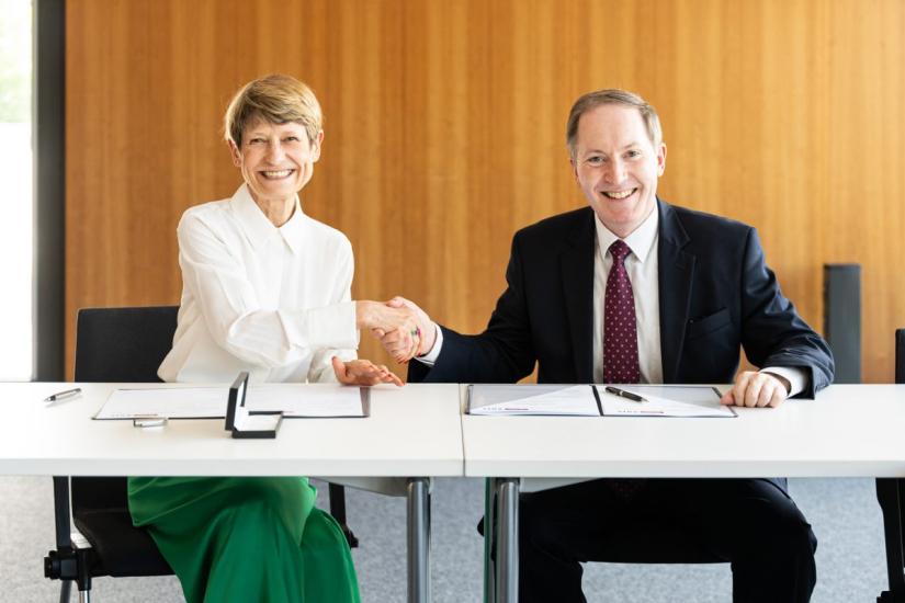 Faculty deans shaking hands
