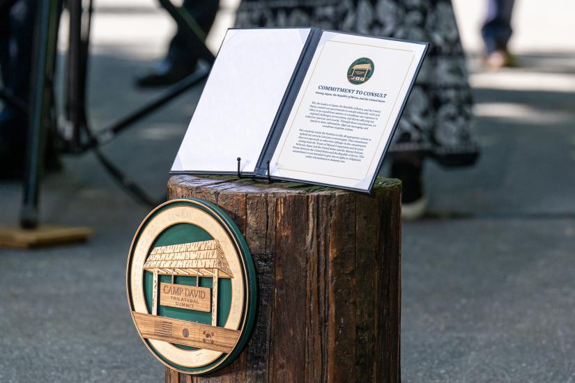 US President Joe Biden hosts a press conference with Japanese Prime Minister Kishida Fumio and South Korean President Yoon Suk Yeol at the Commanding Officers Loop at Camp David, Maryland, USA on August 18 2023. The ‘Commitment to Consult’ reached at the trilateral meeting is on display (Adam Schultz / White House)