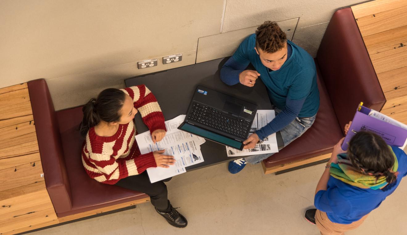 students collaborating in study area