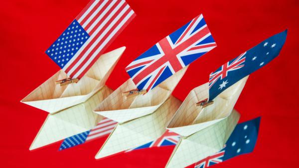 ships with flags of Australia, United States and United Kingdom