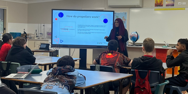 Outreach Officer presenting to students