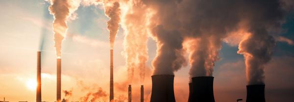 coal fired power station silhouette at sunset