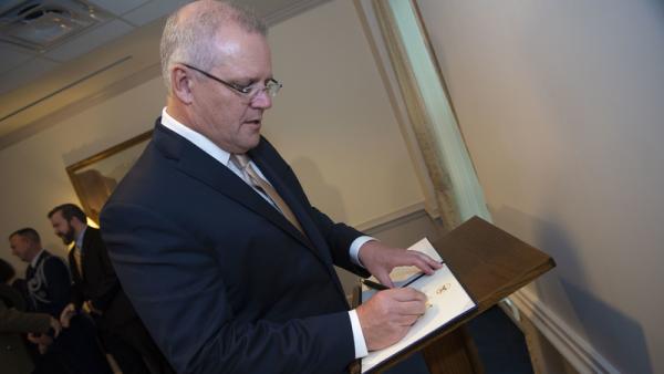 800x450%20Australian%20Prime%20Minister%20Scott%20Morrison%20signs%20a%20guest%20book