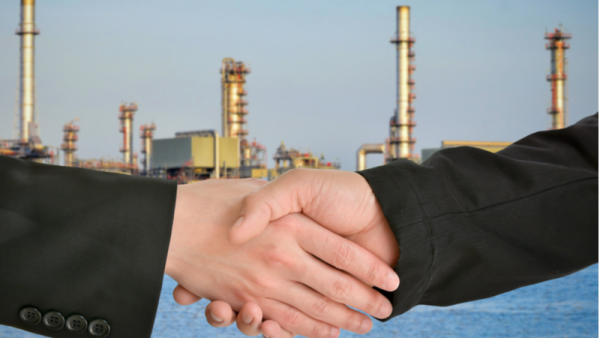 800x450%20Business%20handshake%20with%20industrial%20plant%20background