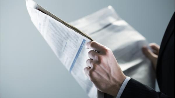 800x450%20Businessman%20reading%20a%20newspaper