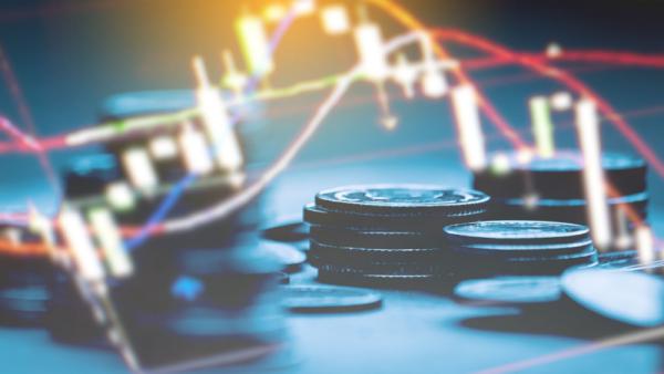 800x450%20Candlestick%20chart%20over%20coin%20stack