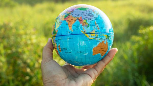 800x450%20hand%20holding%20globe_0