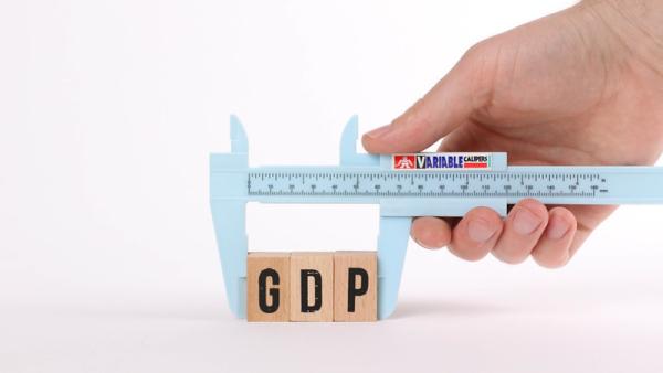 800x450%20Hand%20with%20calliper%20holding%20wooden%20blocks%20with%20the%20word%20GDP%20on%20white%20background