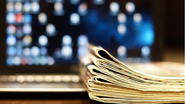 800x450%20newspaper%20and%20laptop_Shutterstock