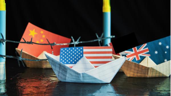 800x450%20paper%20ship%20with%20flags%20of%20USA%2C%20Australia%20and%20China
