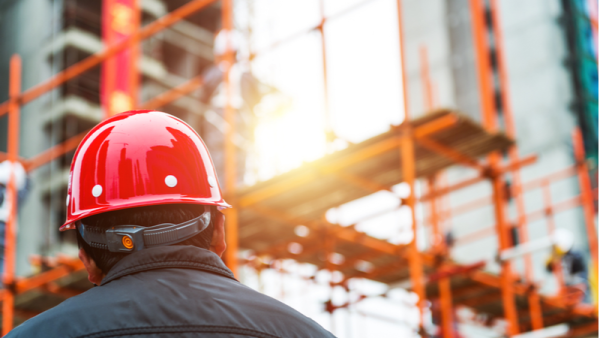 800x450%20Rear%20view%20of%20builder%20inspector%20checking%20construction%20site%20works