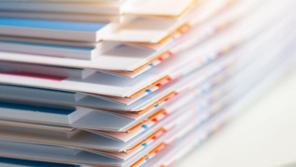 800x450%20Stack%20of%20report%20paper%20documents