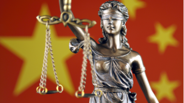 800x450%20Symbol%20of%20law%20and%20justice%20with%20China%20Flag