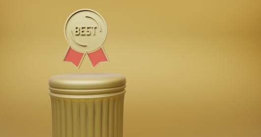 Golden badge saying ‘best’ above a gold column with a gold background.