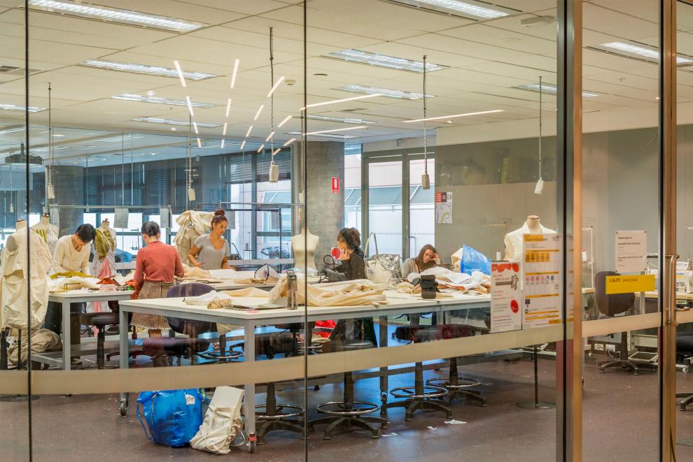 Sewing Studio in use by students using machines and designing textiles