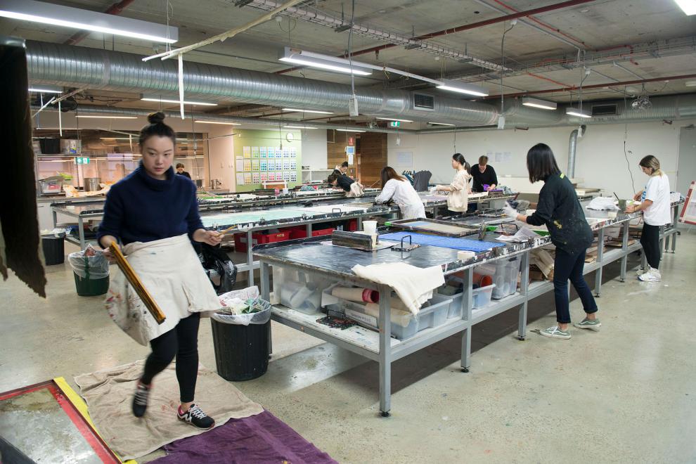 Textile Print Workshop, Students using textile print equipment at DAB studio.