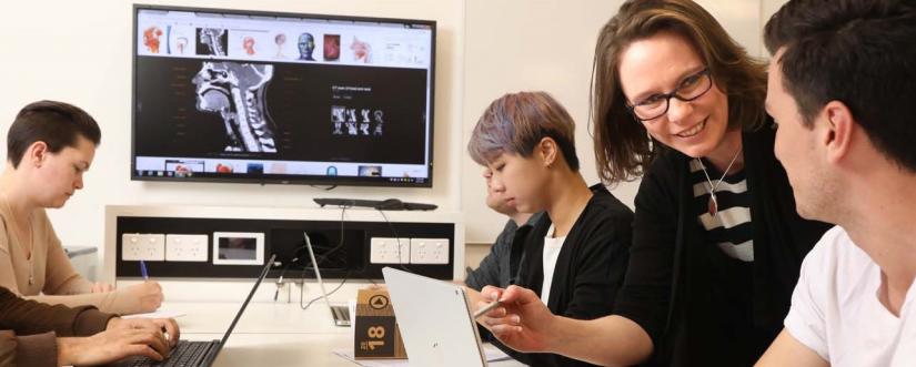 Female teacher with students