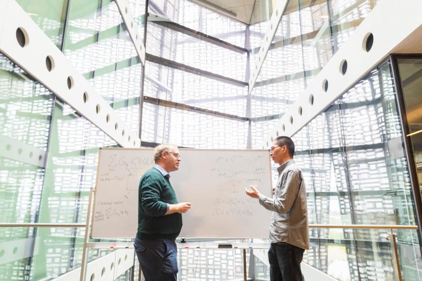 QSI Director, Zhengfeng Ji with A/Prof Marco Tomamichel exchanging ideas in UTS Building 11