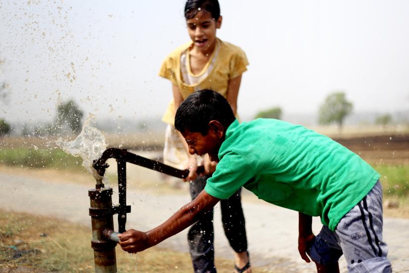2 people and water pump