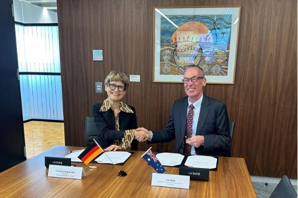 University officials shaking hands