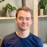 Portrait of Alex Kosheliev - founder of Anicca Digital