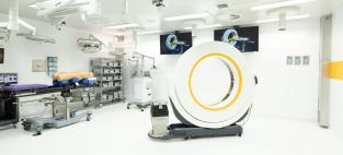 A Stryker Aero CT scan sits in the middle of a laboratory.