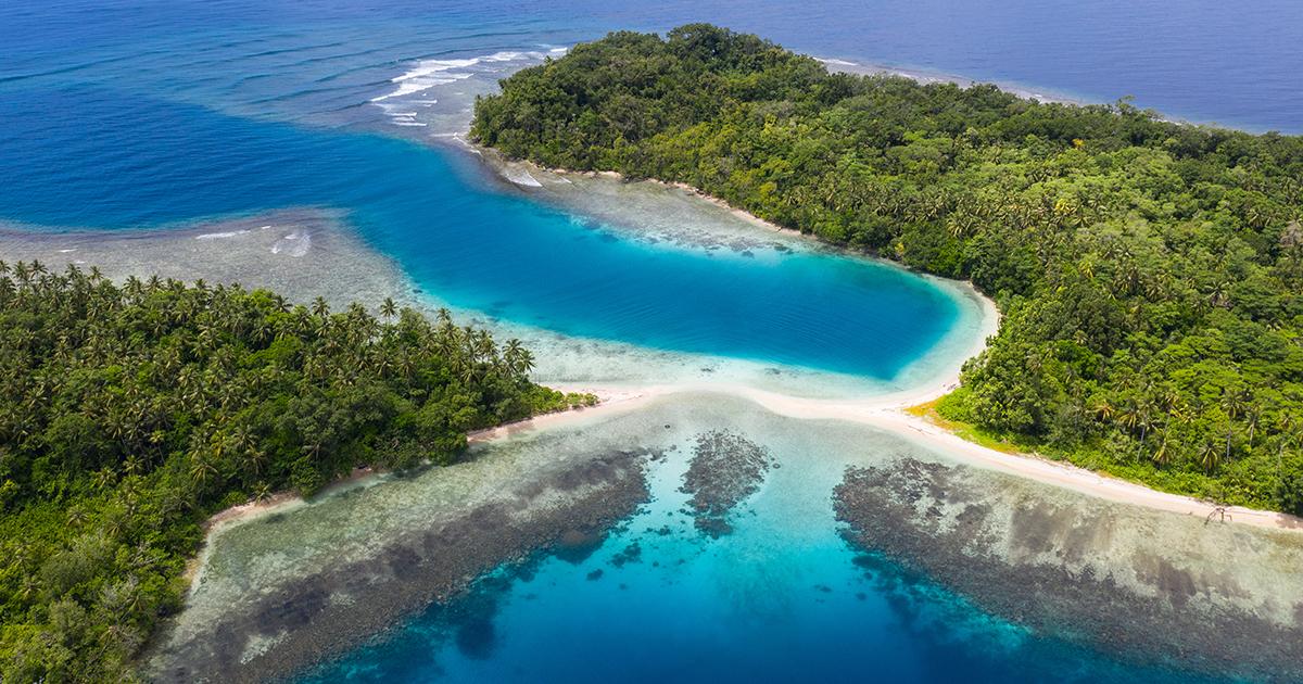 Aerial view of islands, reef and beach in Papua New Guinea