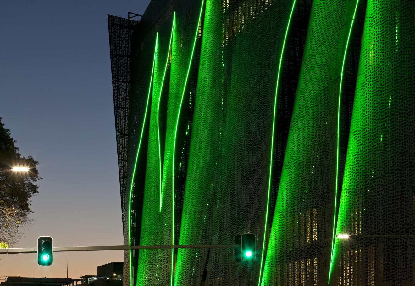 Image of UTS building in green lighting