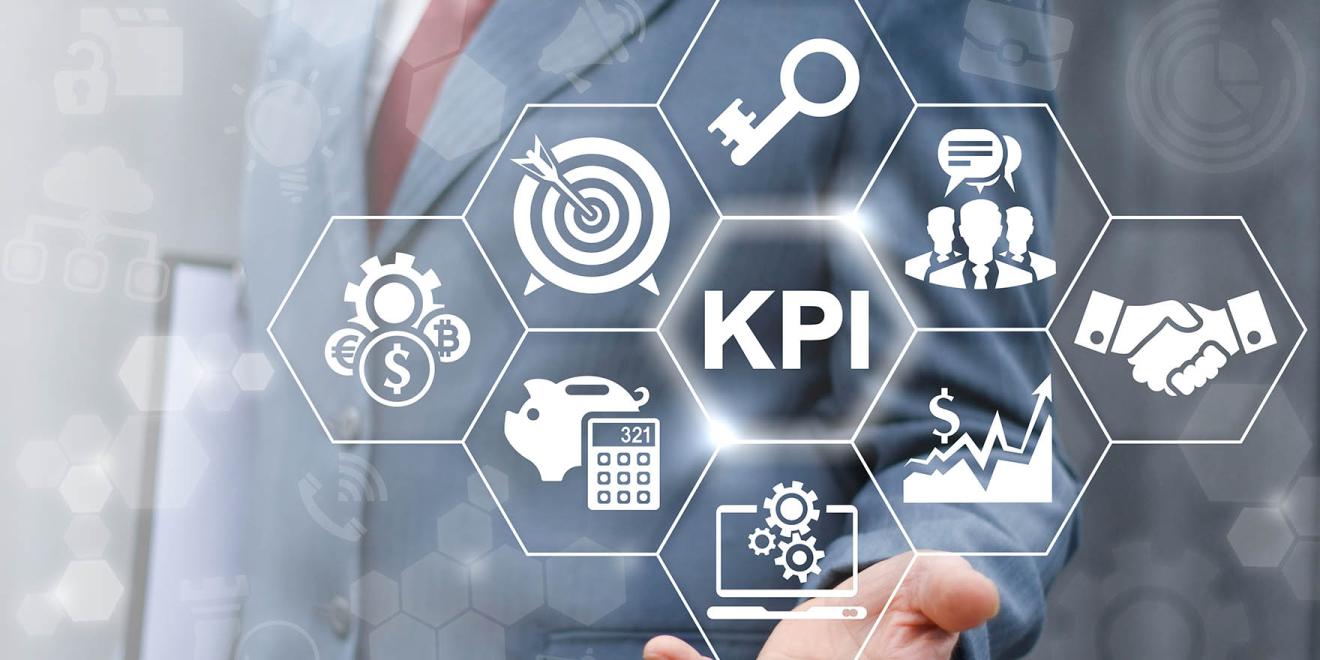 Abstract graphics of KPI, graphs, handshakes and targets with a man in a suit in the background