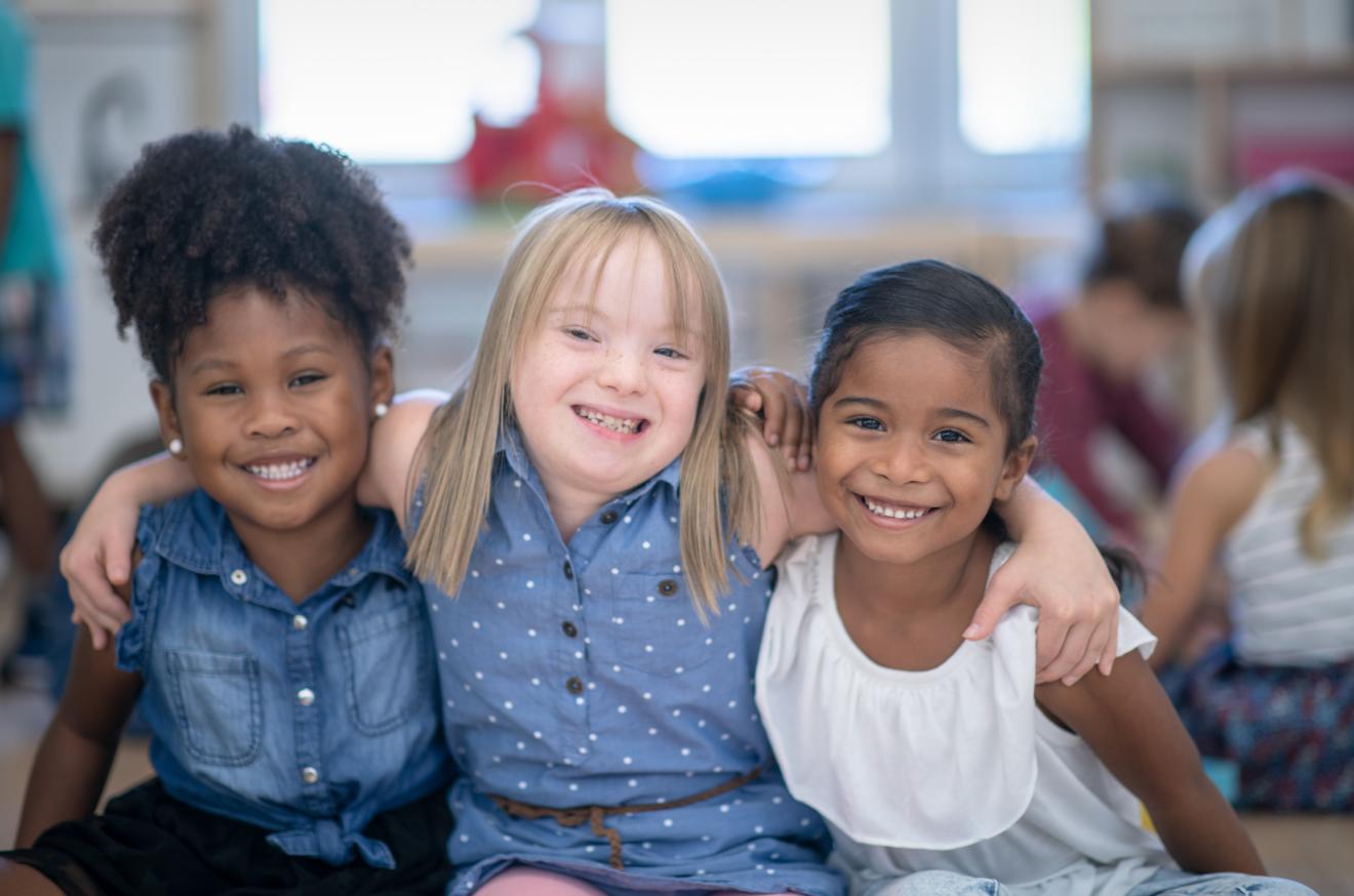 Children of different races and disabilities at school