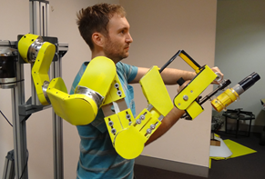 Photo of a prototype of an assistive robotic exoskeleton for abraisive blasting