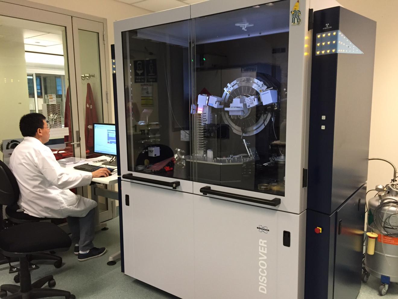 Image of lab user sitting at diffractometer