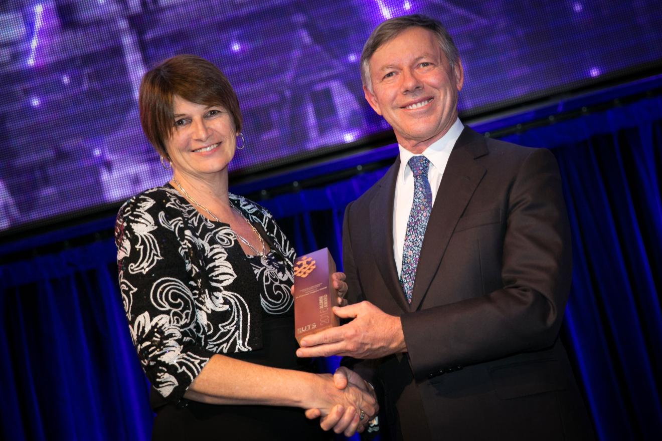 Dr Frances Hughes receives the UTS Chancellors Award for Excellence from Chancellor Brian Wilson