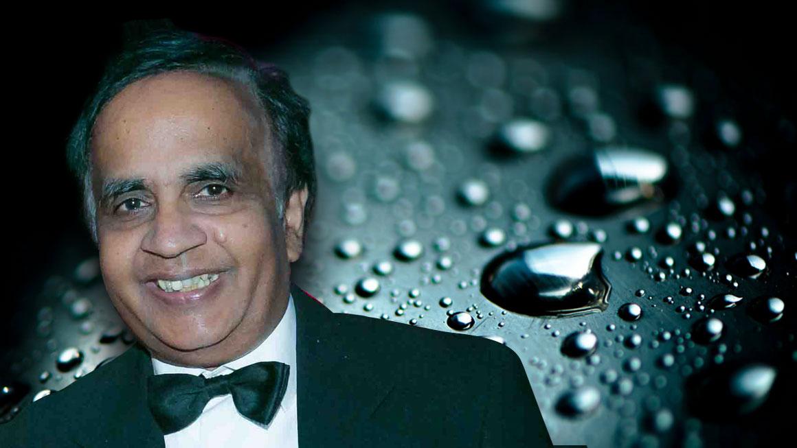 Photo of Saravanamuth Vigneswaran with a background image of water drops