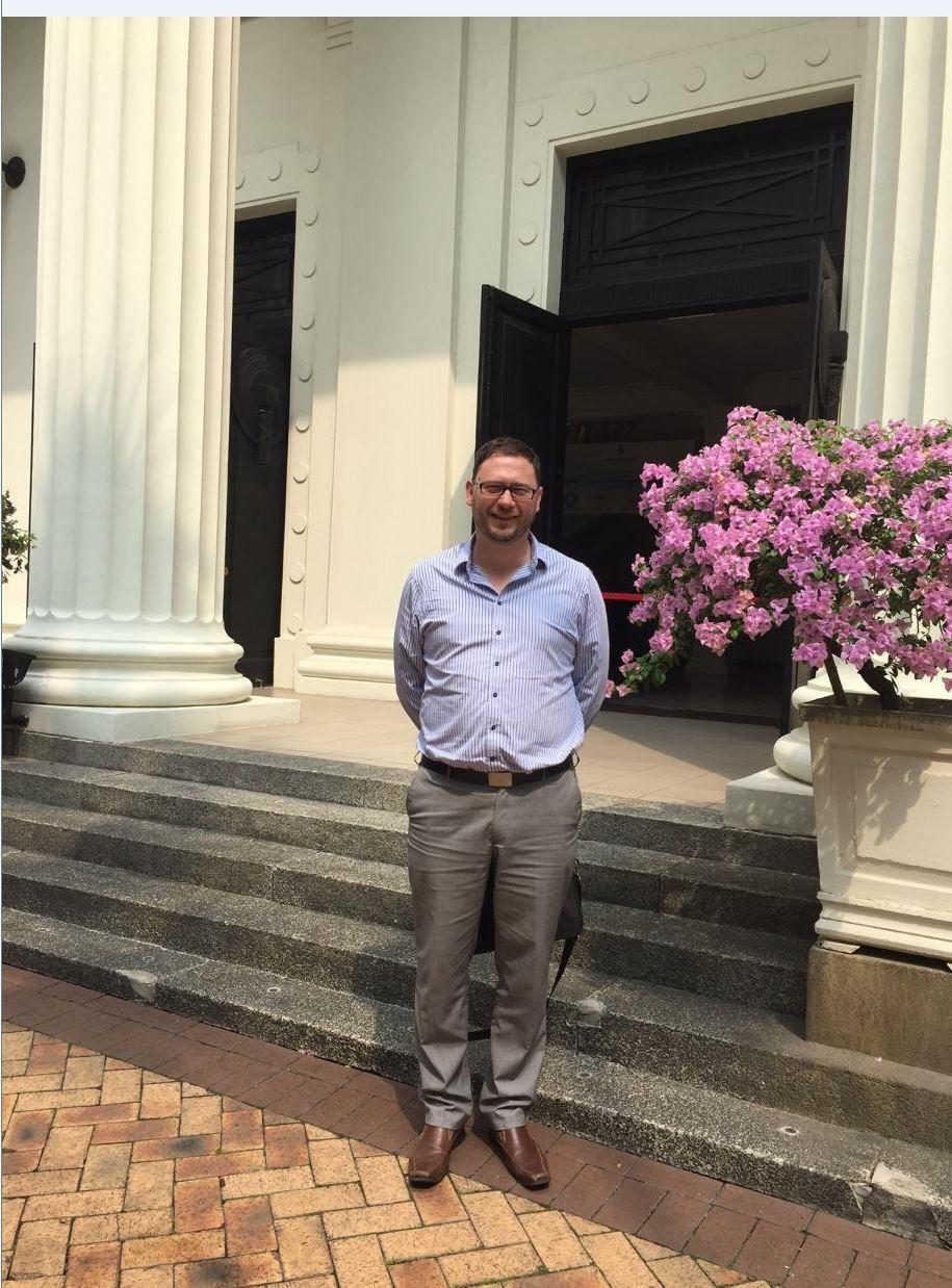 Stephen Goodall is standing outside the Ministry of Health building in Singapore