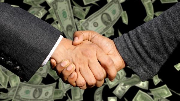 money shaking hands