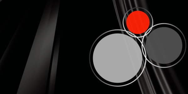 Three intersecting circles in red, charcoal and light grey on a dark background
