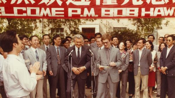 Bob Hawke with red banner
