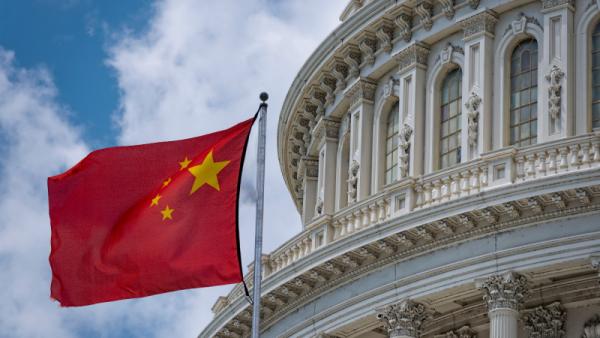 China flag waving on Washington DC Capitol dome