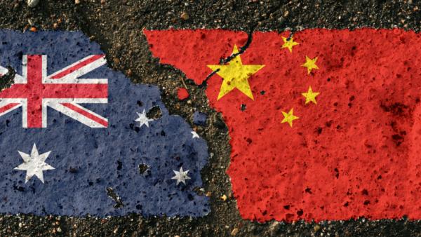 flags of Australia and China on pavement