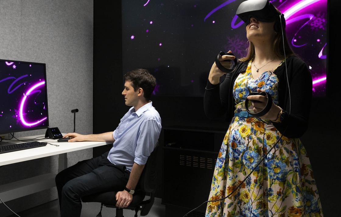 woman uses virtual reality headset