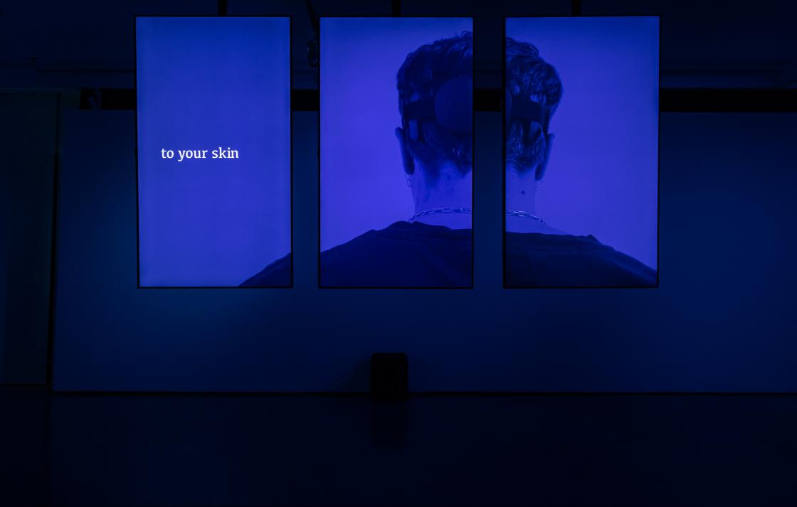 Installation view of UTS Gallery bathed in blue light