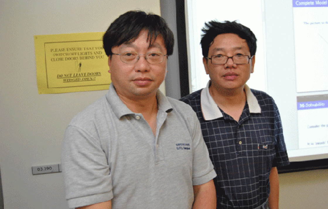 L-R: Prof Yuxi Fu (Shanghai Jiao Tong University), Prof Mingsheng Ying (QCIS) 