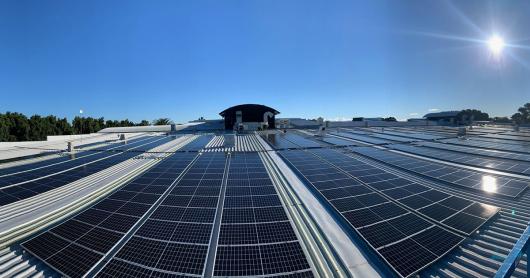 Wide angle photo of solar panels on the Dexus business park in Lord Street, Botany.