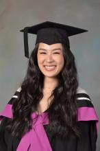 Headshot image of Danni Nguyen in graduation cap and gown.