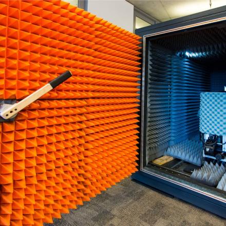 Inside the Mini Compact Range Antenna Chamber, orange and grey pointed soundproofing panels