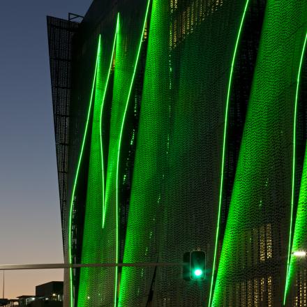 Image of UTS building in green lighting