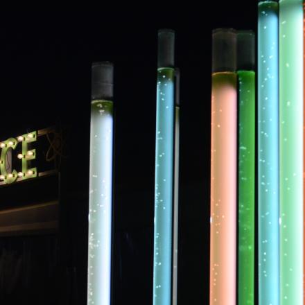 coloured tubes with the word science in the background